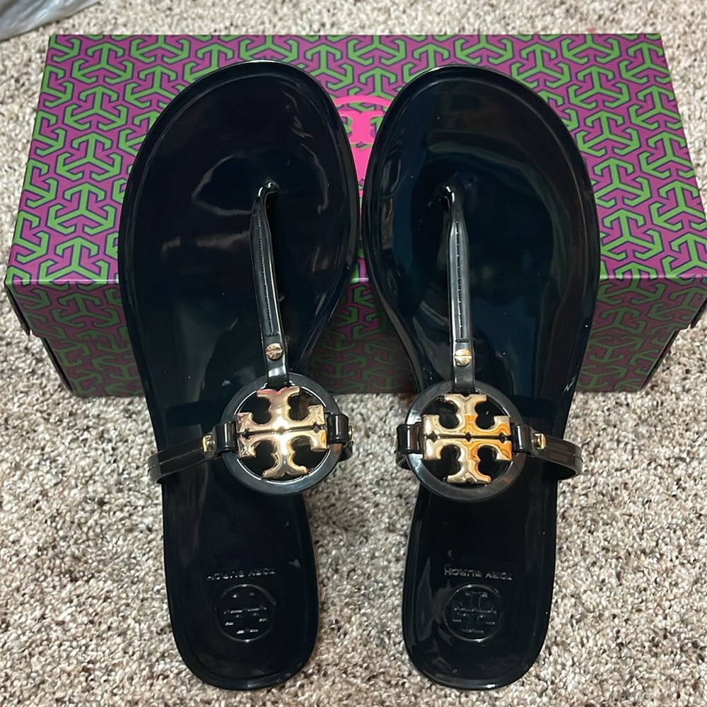 Brand new Tory Burch mini Miller Flat Thong in Perfect Black with Gold logo